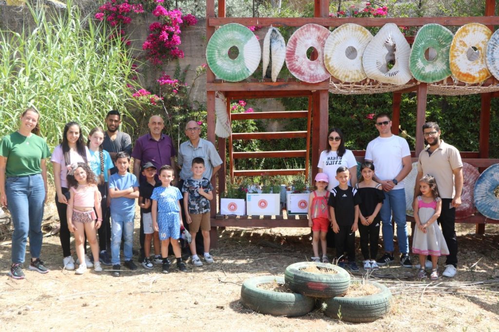 PIBS Hosts Children's Flower Planting Activity